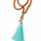 Mala de Rudraksha con Borla Turquesa – Calma y Protección